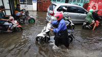 Sebelumnya, pada Rabu (29/1/2024) pukul 20.00 WIB, Badan Penanggulangan Bencana Daerah (BPBD) Jakarta mengabarkan masih ada 33 RT di wilayah Jakarta Barat (Jakbar), 1 RT di Jakarta Utara (Jakut), dan 1 RT di Jakarta Timur (Jatim) yang masih tergenang air. (Liputan6.com/Angga Yuniar)