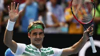 Petenis Swiss Roger Federer lolos ke semifinal Australia Open 2016 usai mengalahkan Tomas Berdych dari Republik Ceko, Selasa (26/1/2016). (Liputan6.com/REUTERS/Thomas Peter)