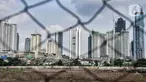 Gedung bertingkat terlihat di kawasan Petamburan, Jakarta, Selasa (23/11/2021). Menteri Keuangan Sri Mulyani Indrawati menyebutkan realisasi pendapatan negara pada Januari-Oktober 2021 naik 18,2 persen year on year (yoy). (merdeka.com/Iqbal S. Nugroho)