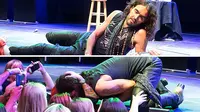 Difoto, Russell Brand Cium Fans dari Atas Panggung