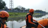 Nekat Terjun Ambil Kunci, Pemuda Hilang di Banjir Kanal Barat