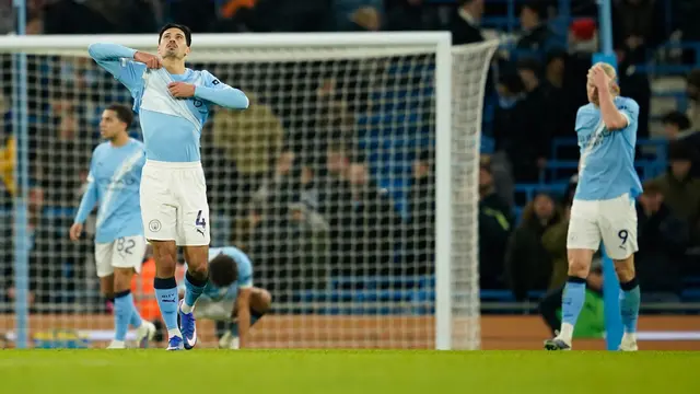 Pemain Manchester City, Tijjani Reijnders (kiri) dan Erling Haaland