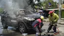 Polisi Timor Leste terpaksa menembakkan gas air mata untuk membubarkan massa yang melakukan protes di hari kedua pada 16 September 2025. (VALENTINO DARIELL DE SOUSA/AFP)