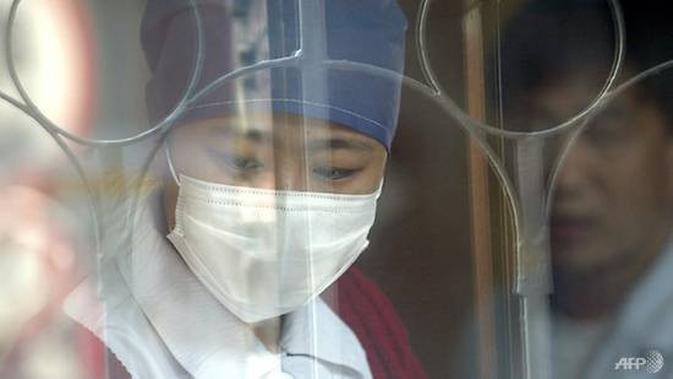 SARS menewaskan 349 orang di daratan Cina dan 299 lainnya di Hong Kong pada 2003. (Liputan6.com/AFP)