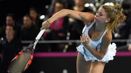 Camila Giorgi mempunyai tinggi badan 168 cm dan mulai bermain di kanacha tenis profesional sejak tahun 2006. (AFP/Anne-Christine Poujoulat)