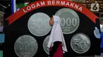Seorang anak terlihat mengunjungi Festival Rupiah Berdaulat Indonesia (Ferbi) di Istora Senayan, kompleks Gelora Bung Karno, Jakarta, Sabtu (19/8/2023). (Liputan6.com/Angga Yuniar)