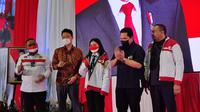 Menteri BUMN Erick Thohir saat memberikan pengarahan kepada 2.686 Calon Pekerja Migran Indonesia (CPMI) di Cibubur, Senin (12/09/2022). (Liputan6.com/Achmad Sudarno)
