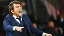 Antonio Conte - Tangan dingin pelatih asal Italia ini tak perlu diragukan lagi. Memenangkan gelar liga bersama Juventus, Chelsea dan Inter Milan merupakan bukti kepiawaiannya dalam meramu tim menjadi juara. (AFP/Vincenzo Pinto)