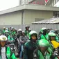 Pengemudi Gojek melintas di Bundaran HI (Liputan6.com/ Ahmad Romadoni)