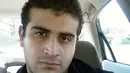 Sebuah foto tak bertanggal diambil dari akun media sosial Omar Mateen. Tersangka penembakan brutal di klub gay Pulse Orlando, Florida, itu tewas diterjang peluru polisi saat baku tembak terjadi di klub tersebut, Minggu (12/6). (HANDOUT/MYSPACE.COM/AFP)
