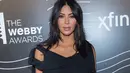 Kim Kardashian lahir dan besar dengan keluarga besar. Kendati demikian, ia mengaku tak ingin miliki anak lebih dari empat. (MARK SAGLIOCCO / GETTY IMAGES NORTH AMERICA / AFP)
