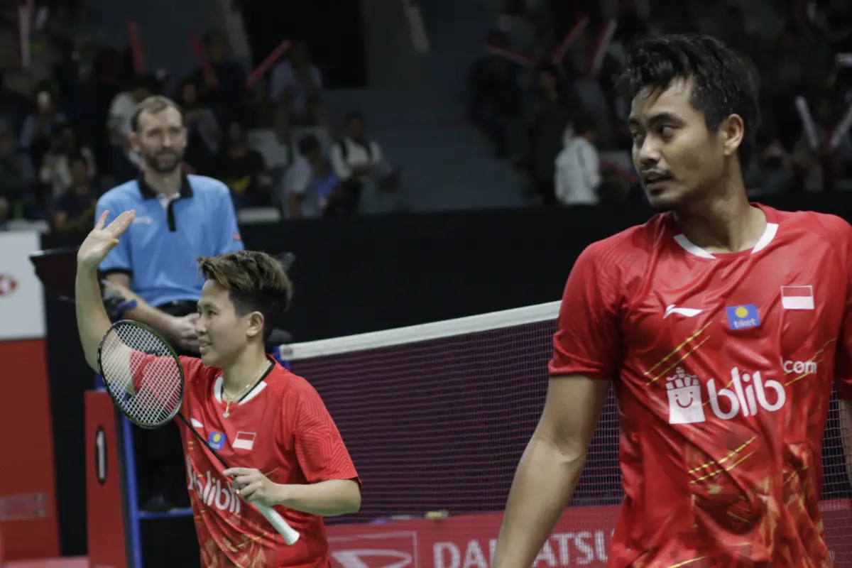 Pebulutangkis Indonesia, Tontowi Ahmad / Lilyana Natsir, merayakan kemenangan atas pasangan India. (Bola.com/M. Iqbal Ichsan)