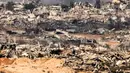 Target utama operasi ini adalah menghancurkan milisi Hamas yang diduga bertahan di jantung kota. (Menahem KAHANA/AFP)