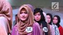 Ekspresi peserta saat memeragakan busana pada acara Hijab Hunt 2018 di Jakarta, Minggu (6/5). Kegiatan ini digagas oleh Baitul Muslimin Indonesia (Bamusi). (Liputan6.com/Angga Yuniar)