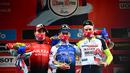 Pria 36 tahun tersebut berhasil finis dengan waktu 4 jam 31 menit 22 detik. Di posisi kedua disusul oleh Pebalap Arkea-Samsic, Nacer Bouhanni dan Alexander Kristoff dari tim Intermarché-Wanty-Gobert Matériaux. (AFP/Marco Bertorello)