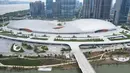 Foto udara pada 1 April 2022 menunjukkan Gymnasium Pusat Olahraga Olimpiade Hangzhou, tempat Asian Games ke-19, di Hangzhou di provinsi Zhejiang timur China. Asian Games ke-19 Hangzhou 2022 rencananya digelar pada 10-25 September 2022. (STR / AFP)