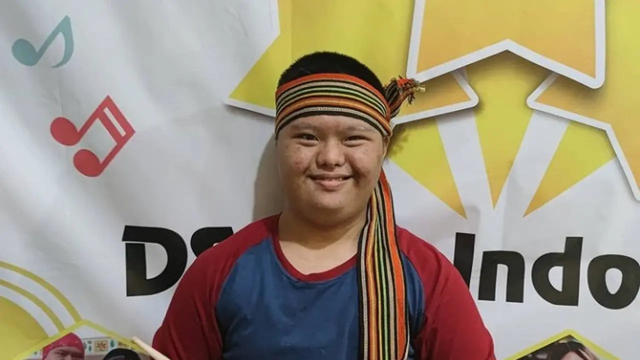 Imansyah Aditya Fitri penyandang down syndrome.