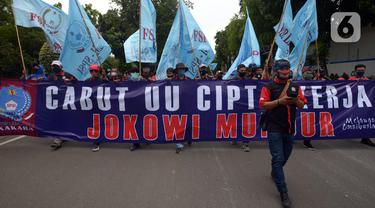 FOTO: Unjuk Rasa Buruh Tuntut Pencabutan UU Cipta Kerja