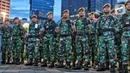 Personel TNI saat apel persiapan pengamanan perayaan malam Tahun Baru 2023 di Bundaran HI, Jakarta, Sabtu (31/12/2022). Pemprov DKI Jakarta telah menyiapkan tujuh titik panggung kemeriahan untuk menyambut tahun baru 2023.  (Liputan6.com/Angga Yuniar)