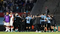 Timnas Uruguay meraih kemenangan 1-0 atas Peru pada laga ke-17 kualifikasi Piala Dunia 2022 zona CONMEBOL, Jumat (25/3/2022) dini hari WIB. Hasil itu membuat Uruguay lolos ke putran final Piala Dunia 2022. (AFP/Matilde Campodonico/POOL)