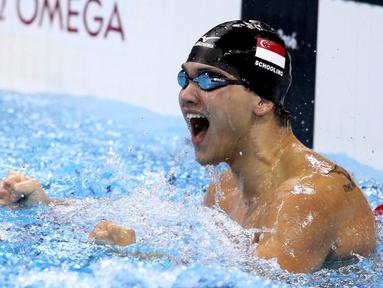  Ekspresi perenang putra Singapura, Joseph Schooling, setelah memenangi 100m gaya kupu-kupu putra Olimpiade Rio 2016 di Olympic Aquatics Stadium, Rio de Janeiro, Brasil, (12/8/2016). (Reuters/Marcos Brindicci)