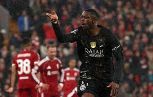 Ousmane Dembele merayakan gol pembuka untuk Paris Saint-Germain di Anfield saat laga leg kedua perempat final Liga Champions 2025/2026 melawan Liverpool, 14 April 2026. (AFP/FRANK FIFE).