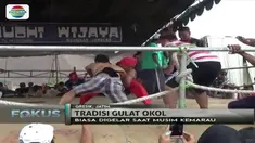 Mulai anak-anak, ibu rumah tangga, hingga orang tua, ikuti 'gulat okol', sebagai tradisi meminta hujan di Gresik, Jawa Timur.