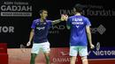 Ganda putra Indonesia, Fajar Alfian/Muhammad Fikri melakukan selebrasi setelah menaklukkan Leo Carnando/Bagas Maulana dalam babak 16 besar Indonesia Masters 2026 di Istora Senayan, Jakarta, Kamis (22/1/2026). (Bola.com/M Iqbal Ichsan)
