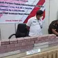 Mantan Bupati Cilacap, Probo Yulastoro mengembalikan uang kerugian negara akibat tindak pidana korupsi senilai Rp6,88 miliar. (Foto: Kejari Cilacap/Liputan6.com)