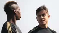 Dua pemain kunci Juventus, Paul Pogba (kiri) dan Paulo Dybala (kanan). (AFP/Marco Bertorello)