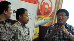 Anggota F-PDIP Erwin Muslimin Singajuru (kanan) saat menghadiri Diskusi "Kas Parpol Anggaran Rakyat atau Konglomerat", Jakarta, Sabtu (9/1/2016). Erwin mendukung wacana pembiayaan partai politik oleh negara. (Liputan6.com/Helmi Afandi) 