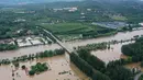 Hujan lebat yang yang memicu tanah longsor yang mematikan di Beijing sejak Rabu (23/7) lalu hingga Senin (28/7/2025) waktu setempat telah menewaskan 30 orang, demikian diungkap media pemerintah. (ADEK BERRY/AFP)