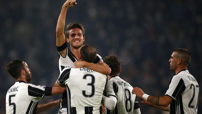 Menit ke-19, Juventus menggandakan skor. Umpan sepak pojok Miralem Pjanic disambut sundulan Daniele Rugani yang tak mampu dihentikan Sportiello. (AFP/Marco Bertorello)