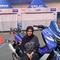 Eca Sabana jadi pembalap wanita yang mampu naik podium ketiga di Yamalube Turbo Matic Drag Battle (YTMDB) Yamaha Cup Race 2026. (Liputan6.com/Dimas Ramadhan)