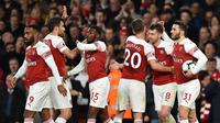 Para pemain Arsenal merayakan gol Aaron Ramsey ke gawang Newcastle United. (AFP/Glyn Kirk)