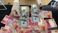Rupiah Dekati 18.000 per Dolar AS Dibayangi Ekspektasi Kenaikan Suku Bunga