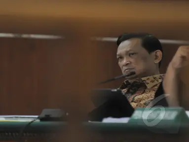 Terdakwa kasus korupsi pengadaan simulator SIM di Korlantas Polri, Brigjen Pol Didik Purnomo  mengikuti sidang lanjutan dengan agenda mendengarkan keterangan saksi di Pengadilan Tipikor Jakarta, Kamis (5/2/2015).  (Liputan6.com/Herman Zakharia)