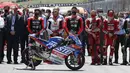 Balapan MotoGP Italia 2021 lalu berjalan dalam suasana duka. Namun, bagi sebagian pembalap, hal ini justru menambah motivasi untuk tampil lebih baik demi menghormati Dupasquier. (Foto: AP Photo/Antonio Calanni)