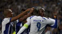  Porto's Jackson Martinez (9) is congratulated by his team mates Yacine Brahimi (L), Alex Sandro and Bruno Martins Indi (R)after scoring his goal against Bayern Munich during their Champions League quarterfinal first leg soccer match at Dragao stadium in 
