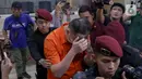 Buron tersebut dikenal dengan berinisial LQ alias JL (Joe Lin). LQ alias Joe Lin ditangkap berdasarkan red notice dan perintah penangkapan dari Shanghai Public Security. (Liputan6.com/Herman Zakharia)