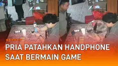 Nasib apes dialami oleh seorang pria ketika bermain games di handphone.