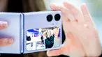 Pekerja menguji kamera ponsel pintar Oppo Find N2 Flip selama Mobile World Congress (MWC) 2023 di Barcelona, Spanyol, pada Rabu 1 Maret 2023. Setelah tiga tahun mengalami gangguan akibat pandemi, MWC dimulai pada hari Senin di Barcelona, Spanyol, dengan para produsen ponsel yang memamerkan perangkat baru dan para eksekutif industri telekomunikasi yang memeriksa peralatan dan perangkat lunak jaringan terbaru. (AP Photo/Joan Mateu Parra)