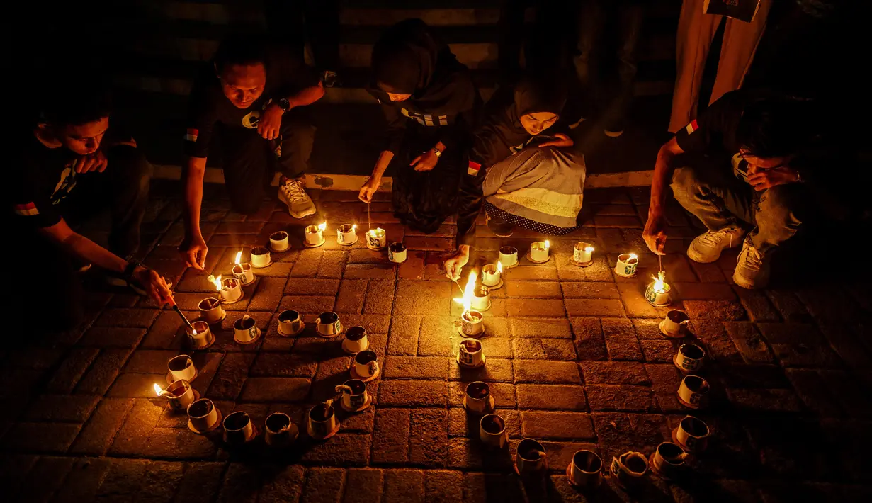 Earth Hour merupakan gerakan lingkungan hidup terbesar dan digelar setiap tahun menjelang akhir bulan Maret. (JUNI KRISWANTO/AFP)