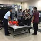 Kapolri Tito Karnavian mengikuti prosedur pemeriksaan di Bandara (Liputan6.com/ Yoseph Ikanubun)