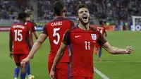 Gelandang Inggris, Adam Lallana, merayakan gol yang dicetaknya ke gawang Slovakia pada laga kualifikasi Piala Dunia 2018 di Stadion Antona Malatinskeho, Trnava, Slovakia, Minggu (4/9/2016). Inggris menang 1-0 atas Slovakia. (Reuters/Carl Recine)