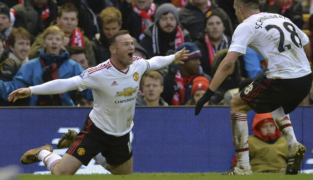 Selebrasi striker Manchester United, Wayne Rooney setelah menjebol gawang Liverpool pada laga Premier League 2015/2016 di Anfield Stadium, Liverpool (17/1/2016). Wayne Rooney total mencetak 6 gol dan 3 assist selama tampil dalam 21 laga Manchester United kontra Liverpool sepanjang sejarah Premier League Liga Inggris. Gol terakhirnya ke gawang Liverpool dicetak pada laga pekan ke-22 Premier League 2015/2016 saat MU menang 1-0. (AFP/Paul Ellis)