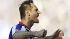 Bek Hertha Berlin, Josip Simunic setelah mencetak gol kemenangan 2-1 atas Werder Bremen dalam sebuah partai Bundesliga pada 19 April 2009 di Berlin. AFP PHOTO/AXEL SCHMIDT