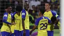 Selebrasi pemain Al Nassr, Cristiano Ronaldo setelah menjebol gawang Al Wehda empat kali dalam pertandingan lanjutan pekan ke-16 Liga Arab Saudi 2022/2023 yang berlangsung di King Abdulaziz Sports City Stadium, Jumat (10/2/2023) WIB. Ronaldo tidak berhenti mencetak hattrick di setiap tahunnya. Dengan hattrick yang baru saja dibuatnya di tahun 2023, maka Ronaldo tercatat sudah 14 tahun beruntun berhasil mencetak setidaknya satu kali hattrick. (AFP)