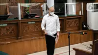 Terdakwa kasus merintangi penyidikan atau 'obstruction of justice' pembunuhan berencana terhadap Brigadir Nopriansyah Yosua Hutabarat (Brigadir J), Baiquni Wibowo menjalani sidang perdana di Pengadilan Negeri Jakarta Selatan, Rabu (19/10/2022). Kompol Baiquni Wibowo ini merupakan eks Kasubbagriksa Baggak Etika Rowabprof Divisi Propam Polri. (Liputan6.com/Faizal Fanani)
