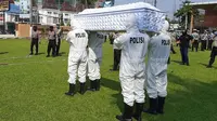 Aparat kepolisian dalam jajaran Polda DIY berjanji membantu pemakaman pasien Corona Covid-19.